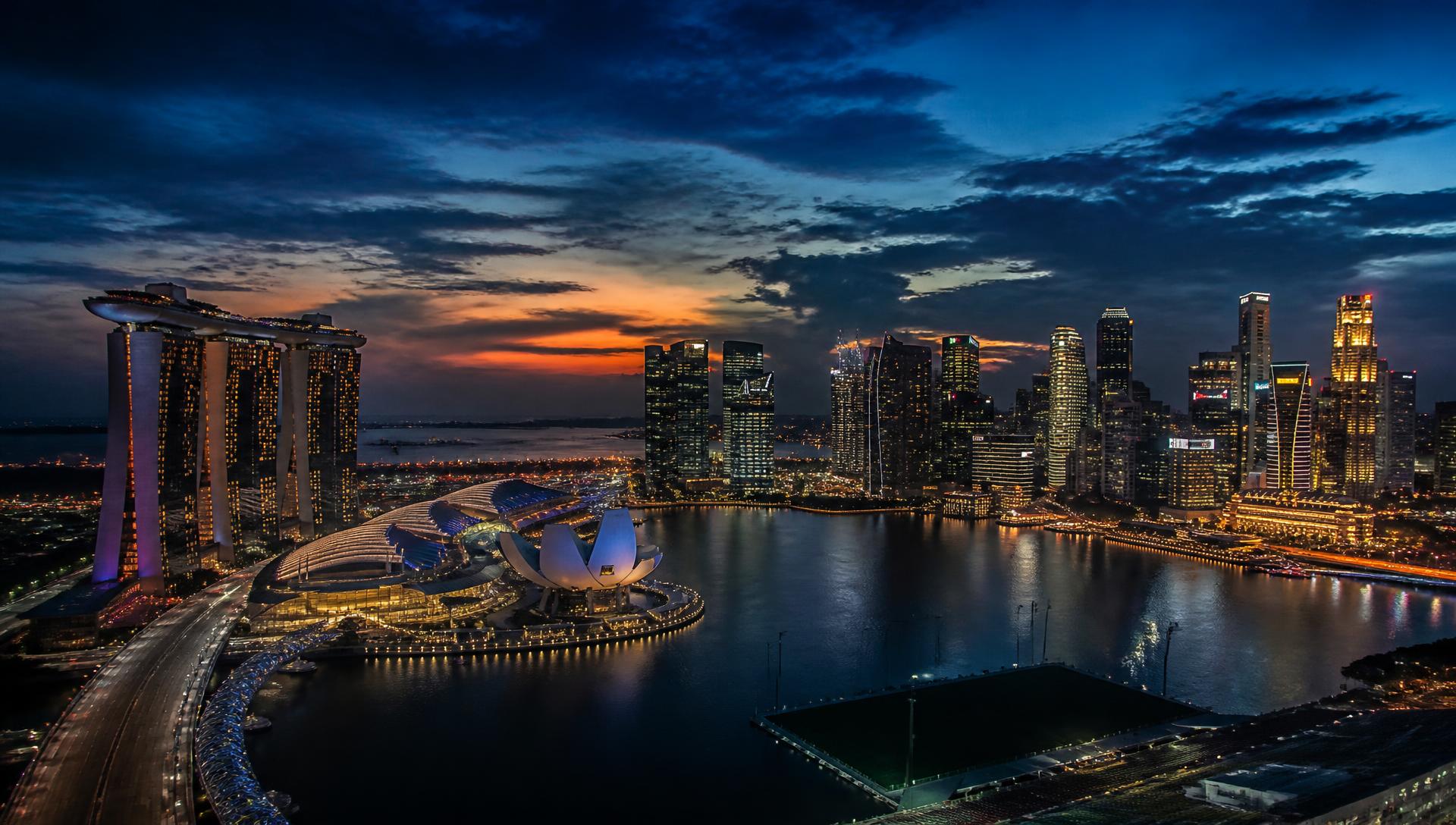 Singapore skyline at dusk over Marina Bay
